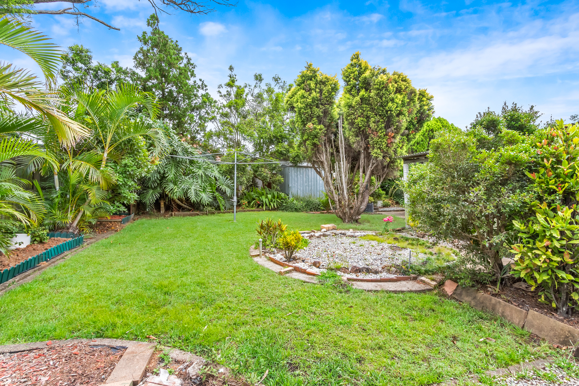 Neat family room with spacious back yard